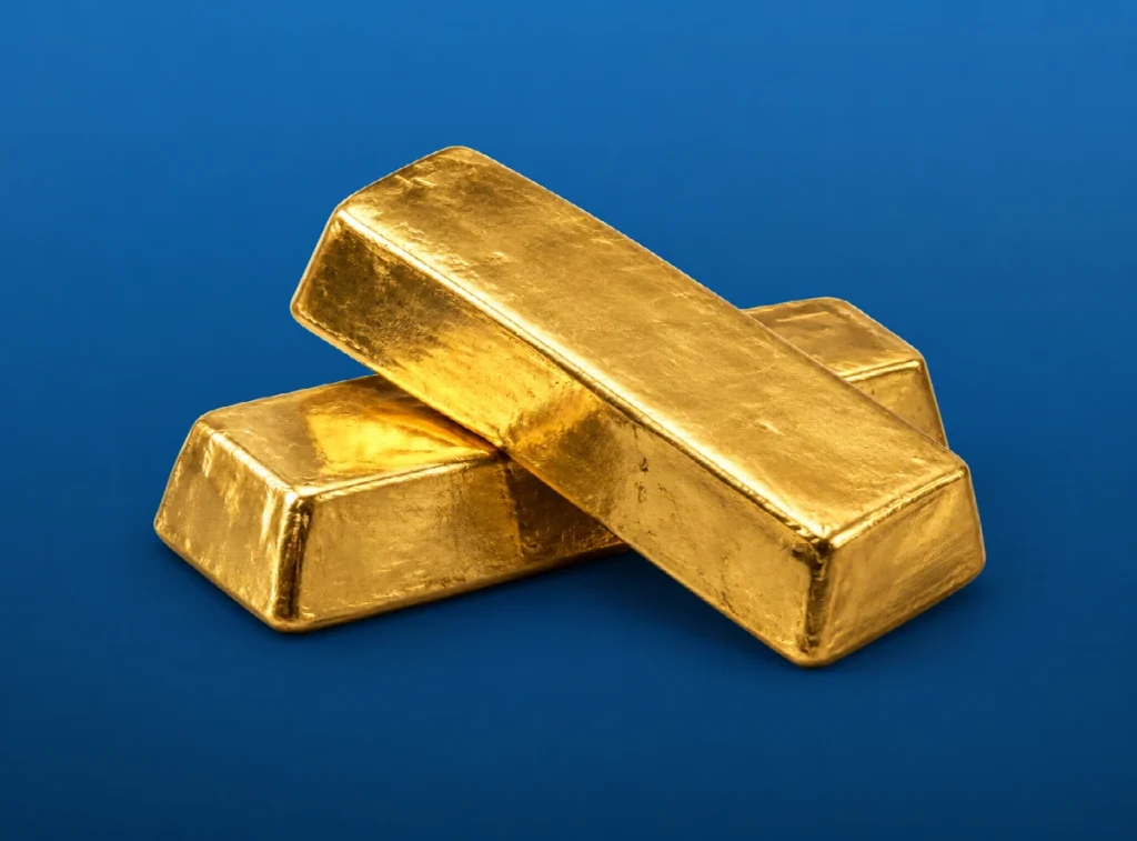 Goldbarren vor blauem Hintergrund